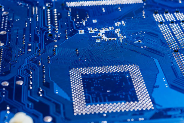 istock Motherboard of an old computer back side, blue color 1361246936