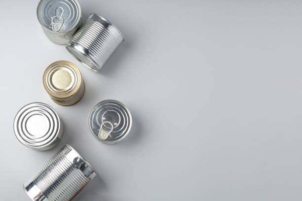 istock Aluminum cans on gray background 1361250000