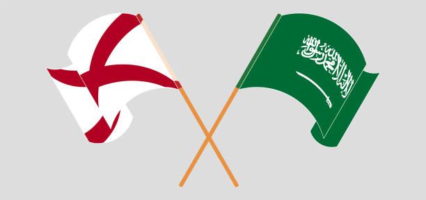 Crossed and waving flags of The State of Alabama and the Kingdom of Saudi Arabia Crossed and waving flags of The State of Alabama and the Kingdom of Saudi Arabia. Vector illustration alabama football stock illustrations
