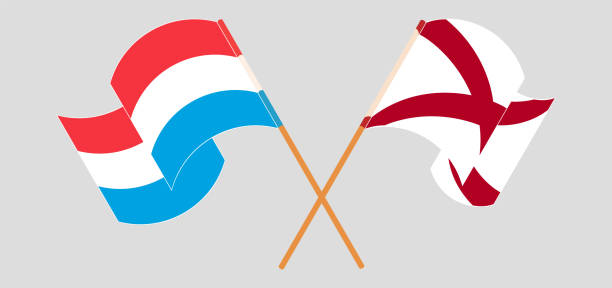 Crossed and waving flags of Luxembourg and The State of Alabama Crossed and waving flags of Luxembourg and The State of Alabama. Vector illustration alabama football stock illustrations