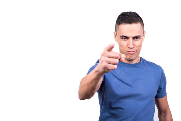 istock Portrait of a man pointing forward while smiling 1361254477