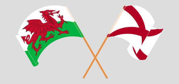 Crossed and waving flags of Wales and The State of Alabama Crossed and waving flags of Wales and The State of Alabama. Vector illustration alabama football stock illustrations