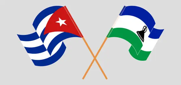 Vector illustration of Crossed and waving flags of Cuba and Kingdom of Lesotho