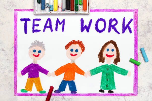istock Colorful drawing: A group of smiling people and the slogan Team Work 1361269217