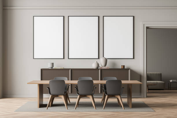 istock Bright gallery room interior with three white posters in row 1361273134
