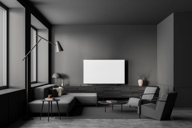 istock Living room interior with sofa and two armchairs, television mockup screen 1361275499