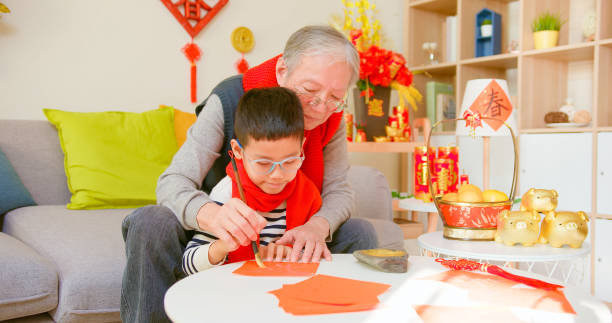 istock grandfather and grandson 1361283578