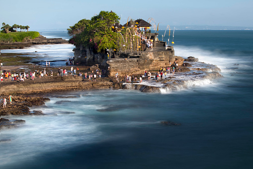A lot of tourists visit the famous place of Tanah Lot Temple, Bali Island Indonesia.