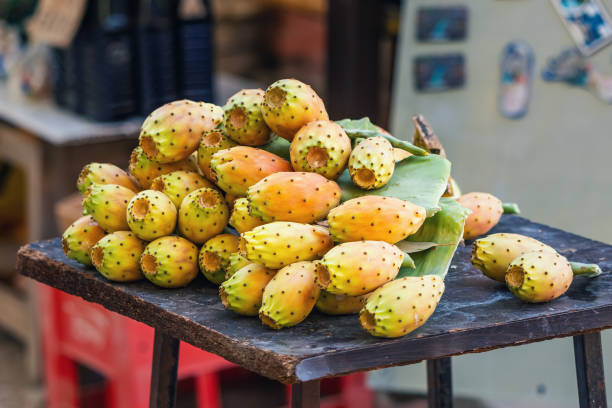 Fresh prickly pear fruit for sale at market Fresh prickly pear fruit for sale at market nopal fruit stock pictures, royalty-free photos & images