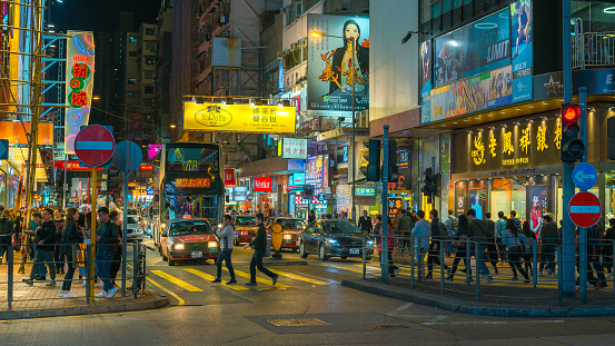 Mong Kok, Hong Kong, 21 Mar 2018: Night view of people enjoying and shopping at Mong Kok at the crowded street at Mongkok District, Hong Kong.
