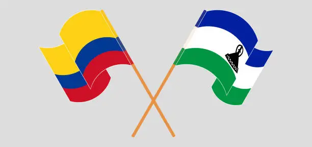 Vector illustration of Crossed and waving flags of Colombia and Kingdom of Lesotho