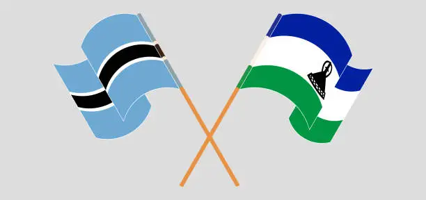 Vector illustration of Crossed and waving flags of Botswana and Kingdom of Lesotho