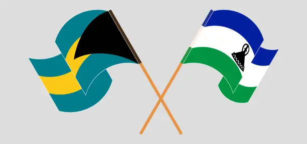 Vector illustration of Crossed and waving flags of the Bahamas and Kingdom of Lesotho