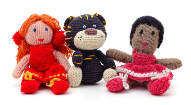 istock Knitted tiger and dolls. 1361294688