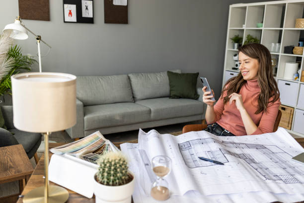 istock Multitasking of young female entrepreneur at work. 1361295676
