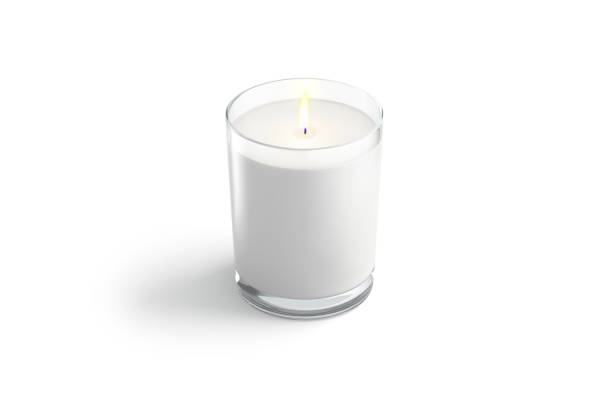 istock Blank white pillar candle in glass jar mockup, side view 1361296874