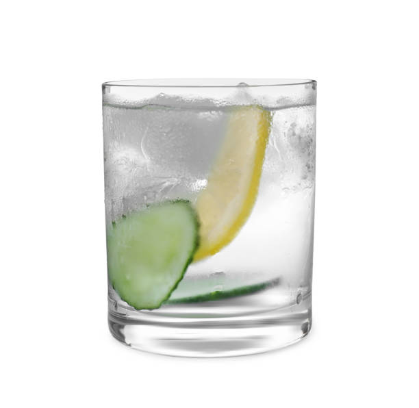 istock Refreshing water with cucumber, lemon and mint isolated on white 1361300434
