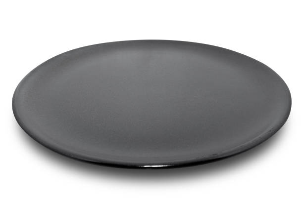 istock Brown circle ceramics plate isolated on white background. 1361301309