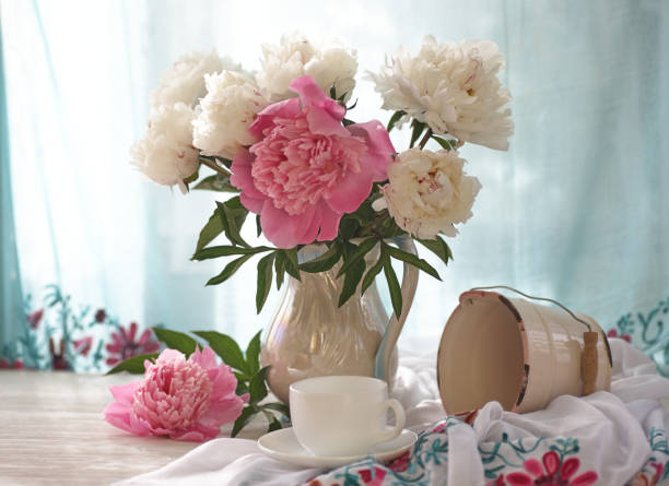 istock Still life with white and pink peonies in a white vase 1361301541