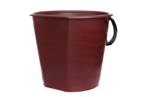 istock empty brown plastic bucket with black handle on white isolated background 1361302872