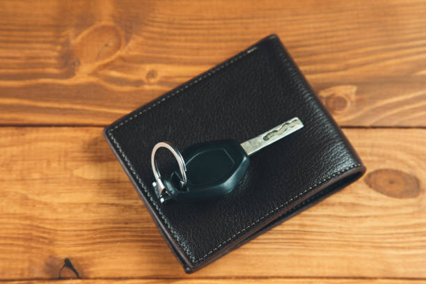 istock wallet and car key on the table 1361303908