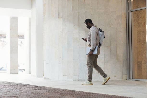 istock African American Businessman Leaving Office Building 1361314062