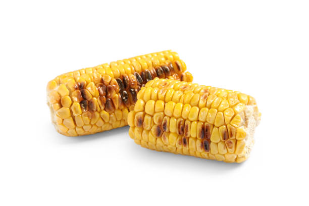 istock Tasty grilled corn cobs on white background 1361314144