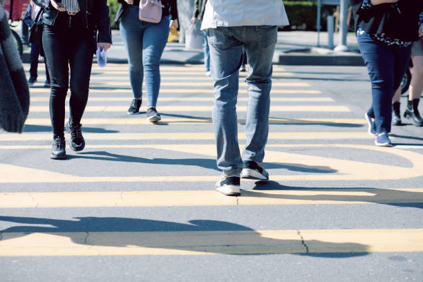 istock people walk on the sidewalk 1361316424