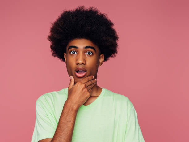 istock Portrait of emotional afro guy 1361316548