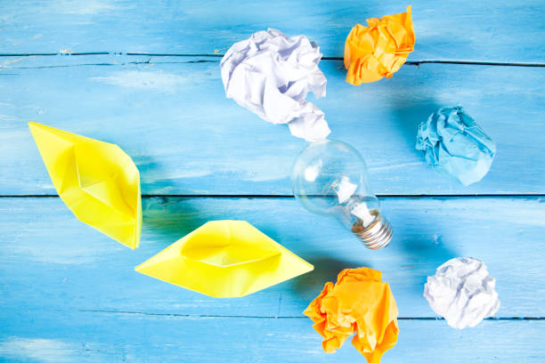 istock wads of paper and a light bulb 1361321549