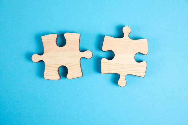 istock two pieces of the puzzle 1361321665