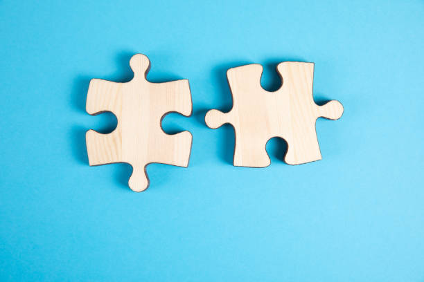 istock two pieces of the puzzle 1361321686