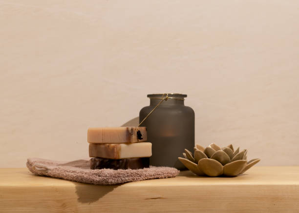 istock Organic solid hair shampoo and handcrafted soap with all natural plant-based essential oils on a wooden bathroom shelf. 1361325547