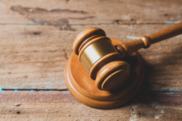 istock judge hammer on a wooden table 1361328589