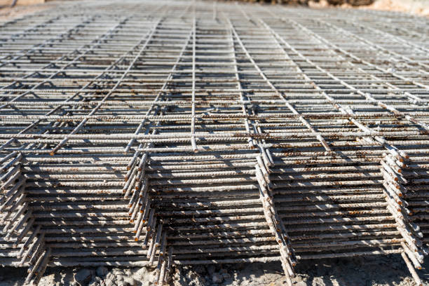 istock Steel grating is prepared to make cement floors for construction 1361328739