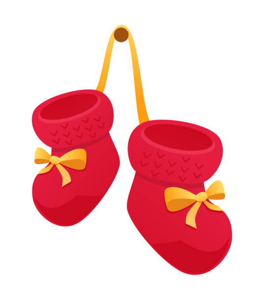 Baby booties - modern flat design style isolated icon Baby booties - modern flat design style isolated icon. Neat detailed image of red knitted warm slippers with yellow bows for babies. First shoe, happy child, motherhood, offspring care idea. baby booties stock illustrations