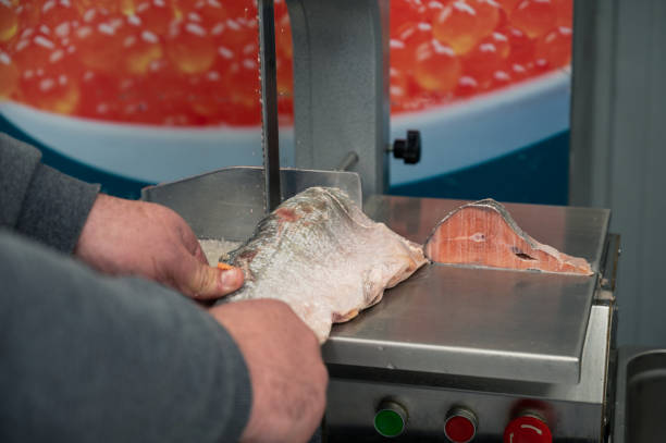 istock Service for cutting fish on a steak in a fish supermarket 1361337843