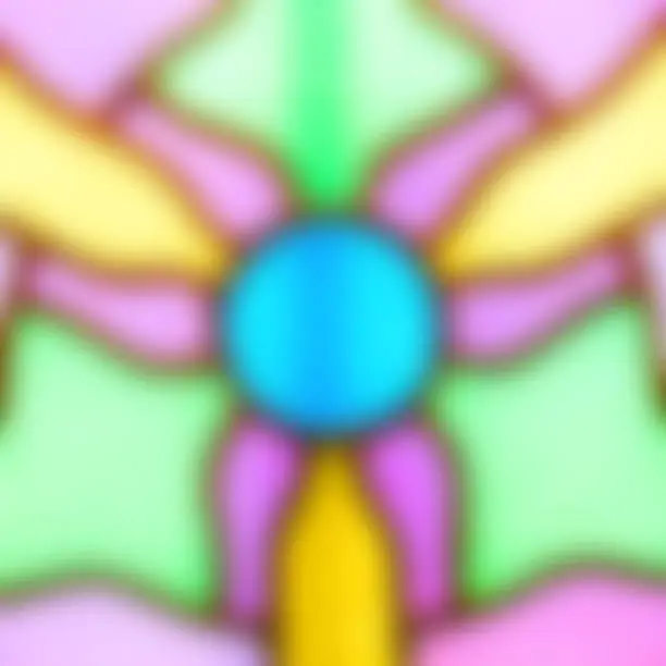 Background blur of stained glass. Glass is purple, blue, yellow, and green. Mostly left-right symmetrical.