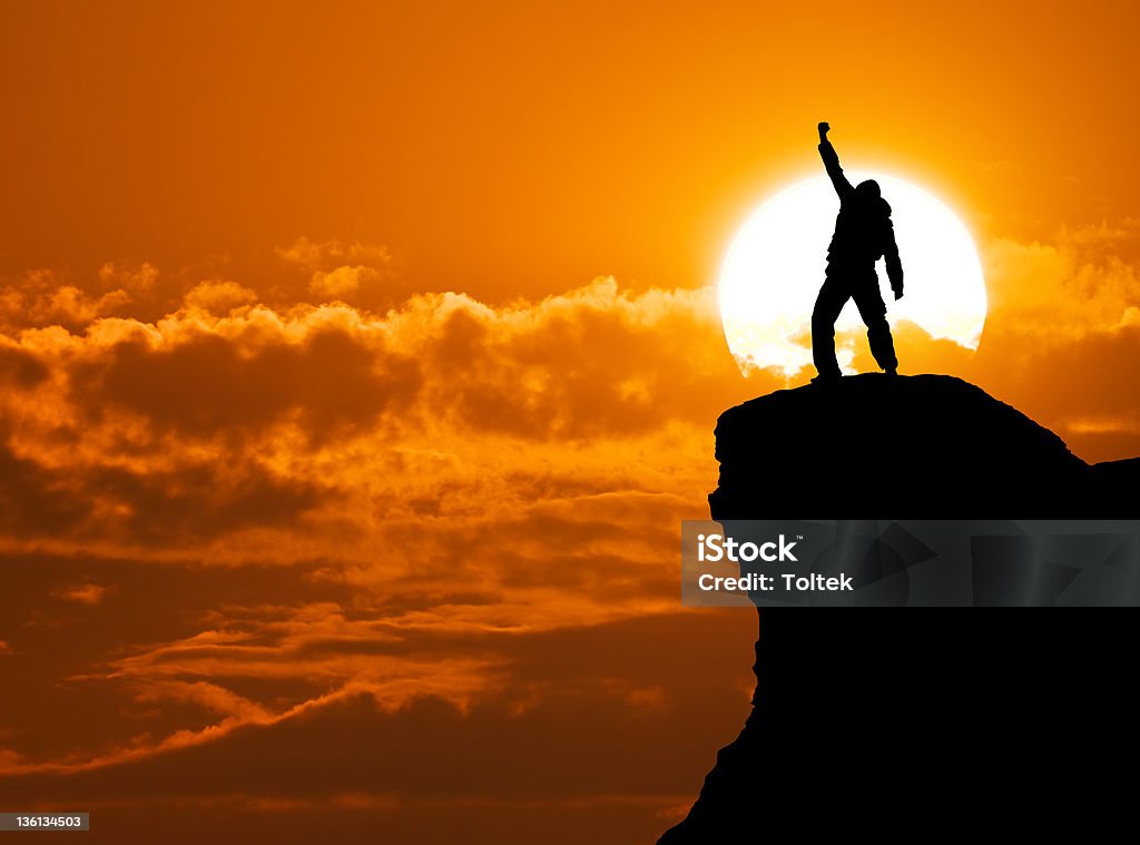 Man on top of mountain Man on top of mountain. Conceptual design. Climbing Stock Photo