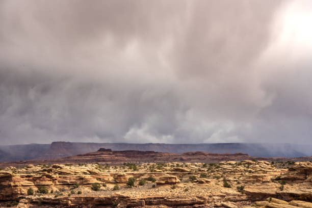 istock Low Rain Clouds Passing Over The Mesa North Of The Needles 1361346678