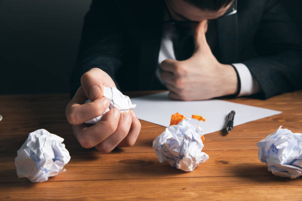 istock tired man wrinkles paper 1361355375