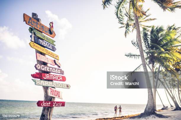 Multicolored Sign Showing Many Caribbean Travel Destinations Stock Photo - Download Image Now