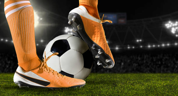 istock Football player man in action 1361355624