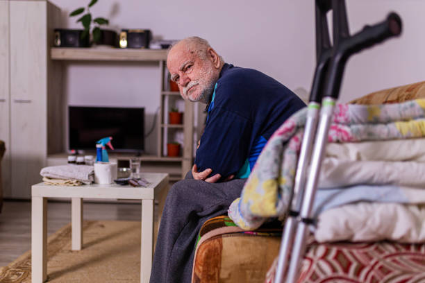 Physically disabled senior man, at nursing home stock photo