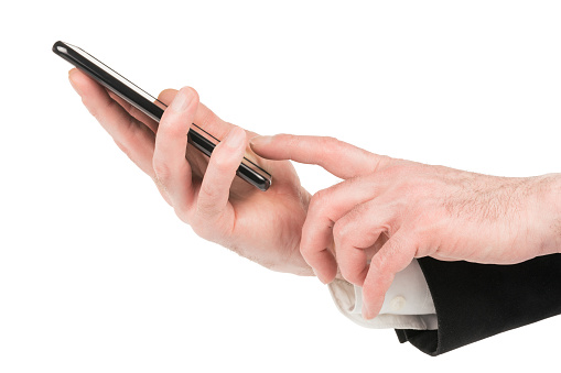 Man hands in  black suit using smartphone. Isolated on white, clipping path included