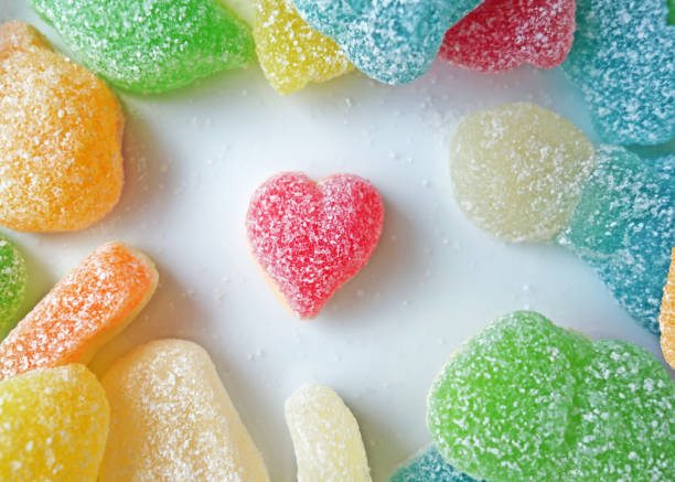 istock Close Up Red Heart Candy Photo Background 1361362424