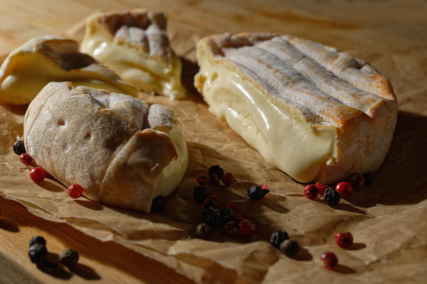 istock Close up of a cut round red smear cheese 1361365036