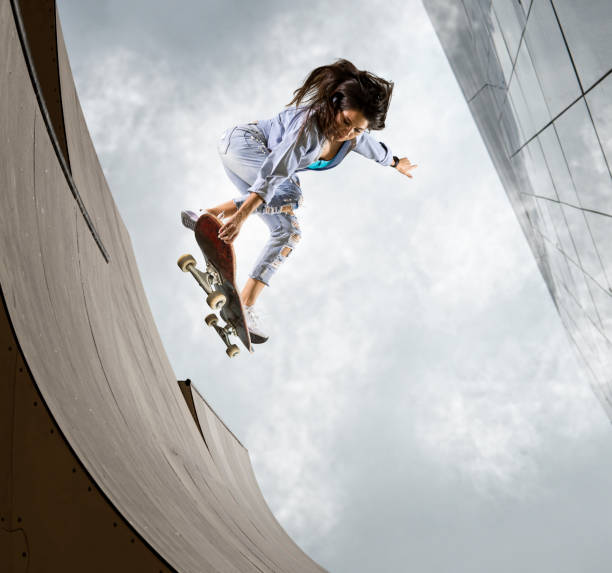 istock Skater doing kickflip on the ramp 1361370597