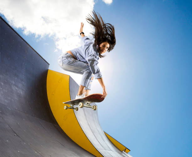 istock Skater doing kickflip on the ramp 1361370604