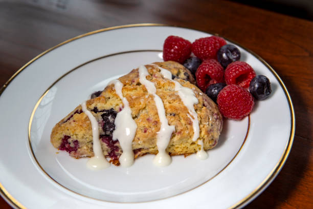 istock Freshly baked raspberry blueberry scones 1361372534